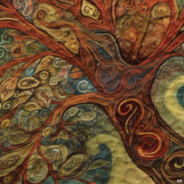 Close-up of Gustav Klimt-inspired mosaic artwork and spiral branches on an artistic bedding set.