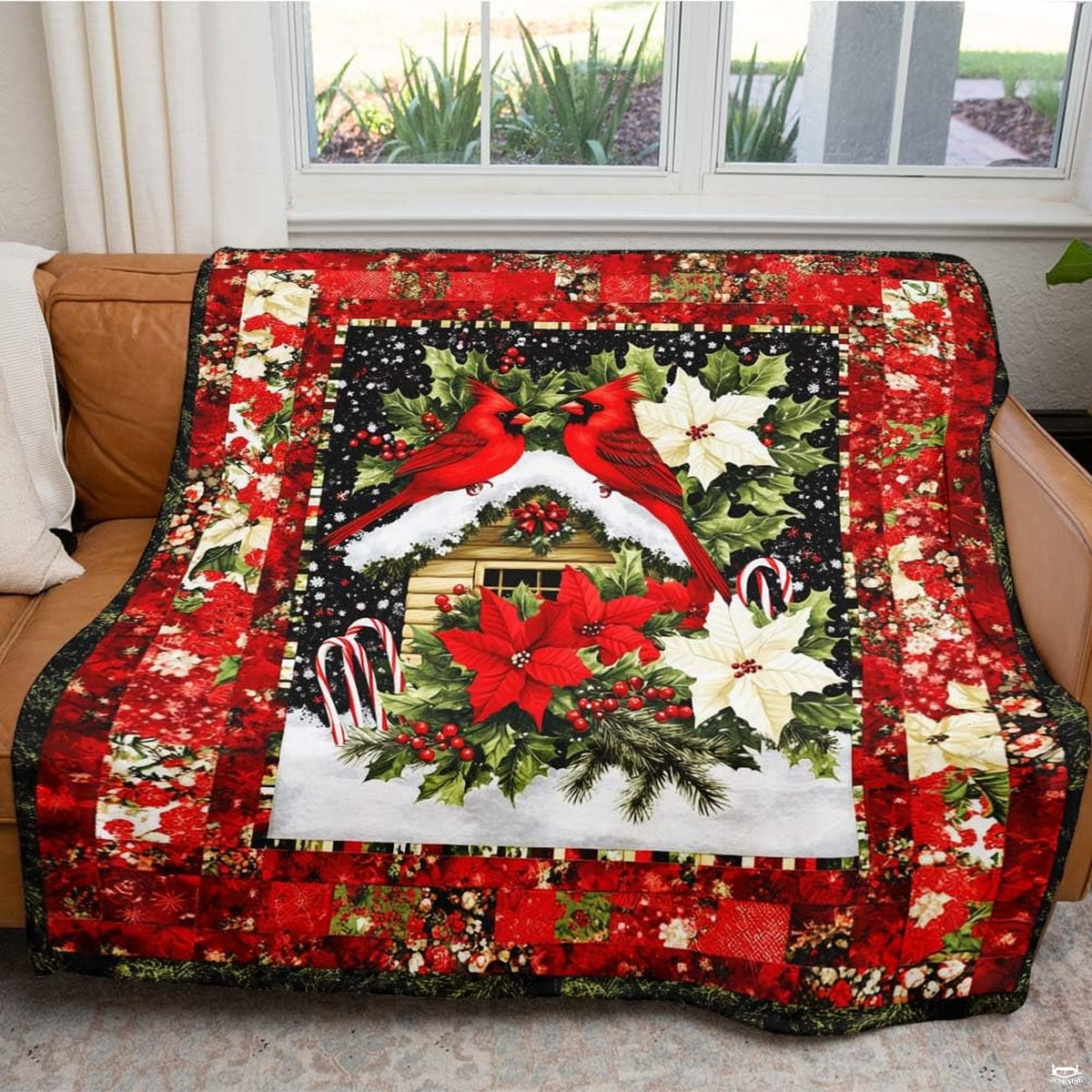 Winter bedroom styling with red cardinal bedding, crimson borders, and painted snowflakes.
