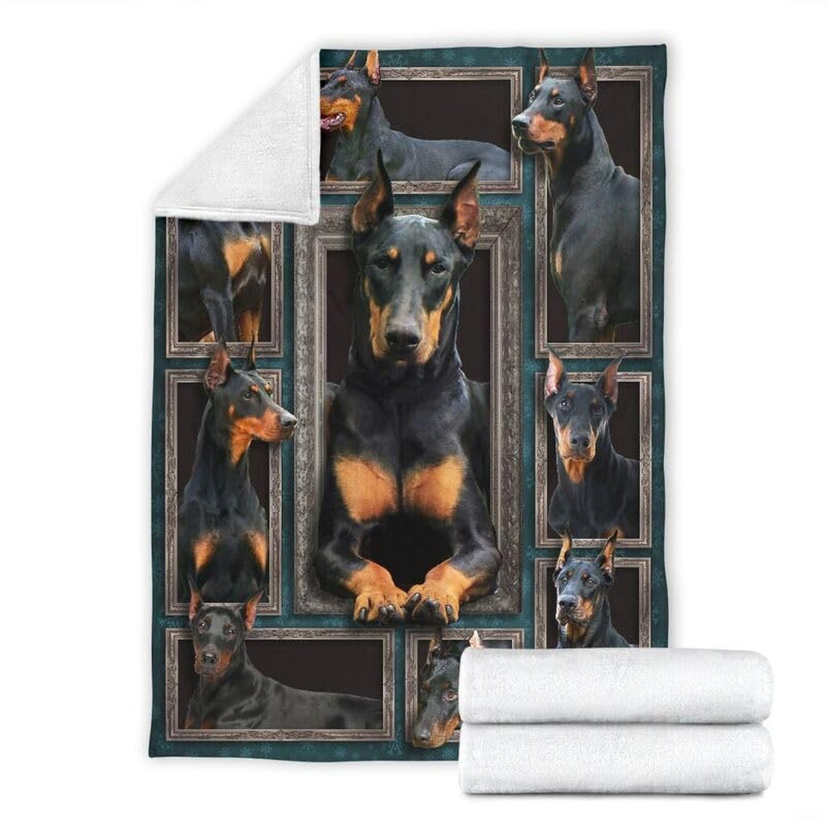 Folded corner and rolled layout of the Doberman Pinscher blanket showing the white reverse side.