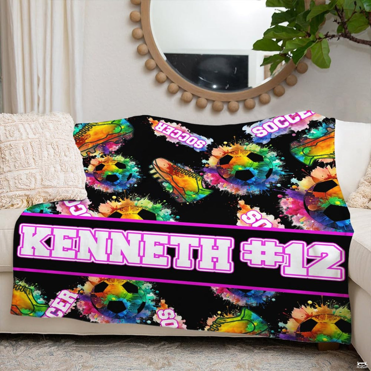 Living room styling with rainbow paint splatter soccer blanket