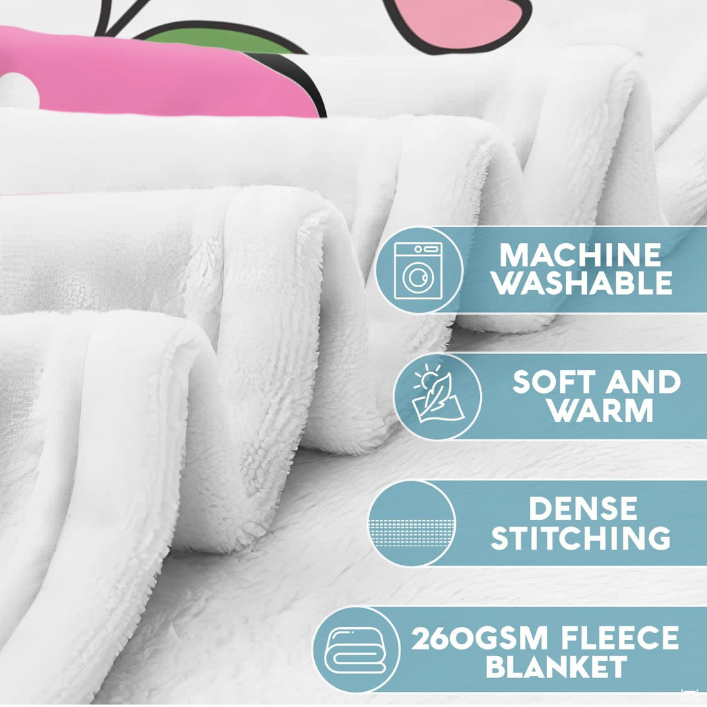 Close-up view of flowers bedding set showcasing pastel polka-dotted script and floral motifs.