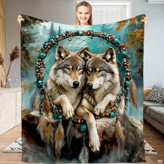 Wolf pair resting inside a beaded turquoise dreamcatcher hoop against a misty pine forest background.