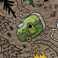 Close-up of the doodle-style camper van, campfire, and wildlife illustrations on a rustic bedding set