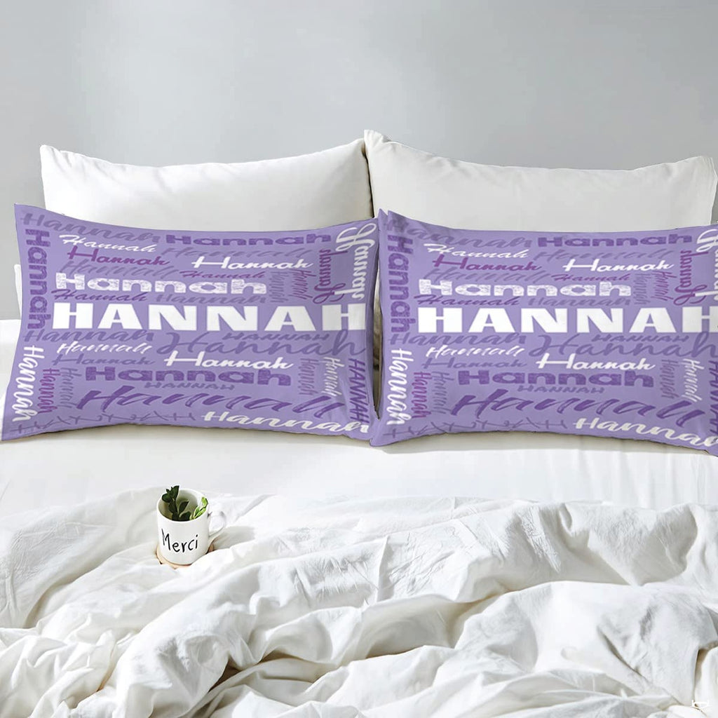 Close view highlighting artistic purple font variations and textured typographic prints on bedding.
