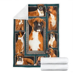 Folded corner and rolled layout of the Fawn Boxer Dog blanket showing the white reverse side.