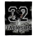 Action football player artwork in black and white for dynamic football bedroom decor ideas.
