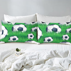 Styled bedroom scene displaying the emerald pitch sports graphic design across the bed setup.
