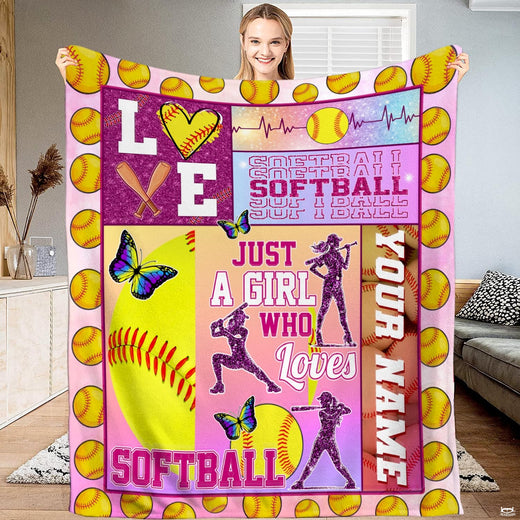 Lifestyle presentation of woman holding girls softball collage throw blanket showcasing player silhouettes.