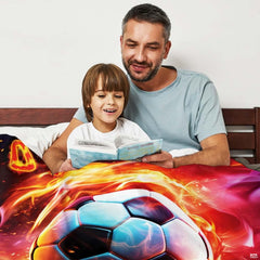 Bed setting with parent and child reading book beneath the swirling soccer fire design.