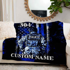 Patriotic law enforcement bedding display in modern bedroom with slate interior accents.