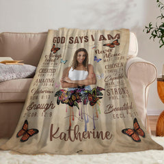 Side angle view displaying tea-stained vintage parchment background and colorful butterfly tones of the blanket
