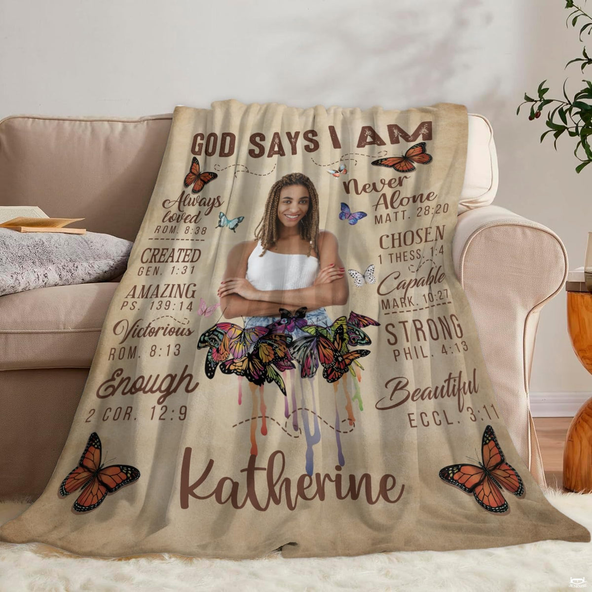 Side angle view displaying tea-stained vintage parchment background and colorful butterfly tones of the blanket