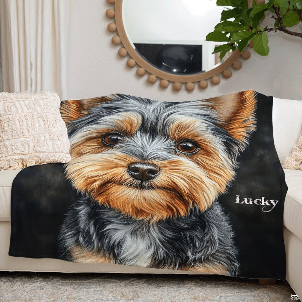 Folded presentation of the Yorkie dog throw blanket resting neatly on an armchair.