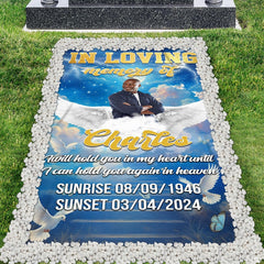 Angled graveside perspective of celestial tribute drape on lawn