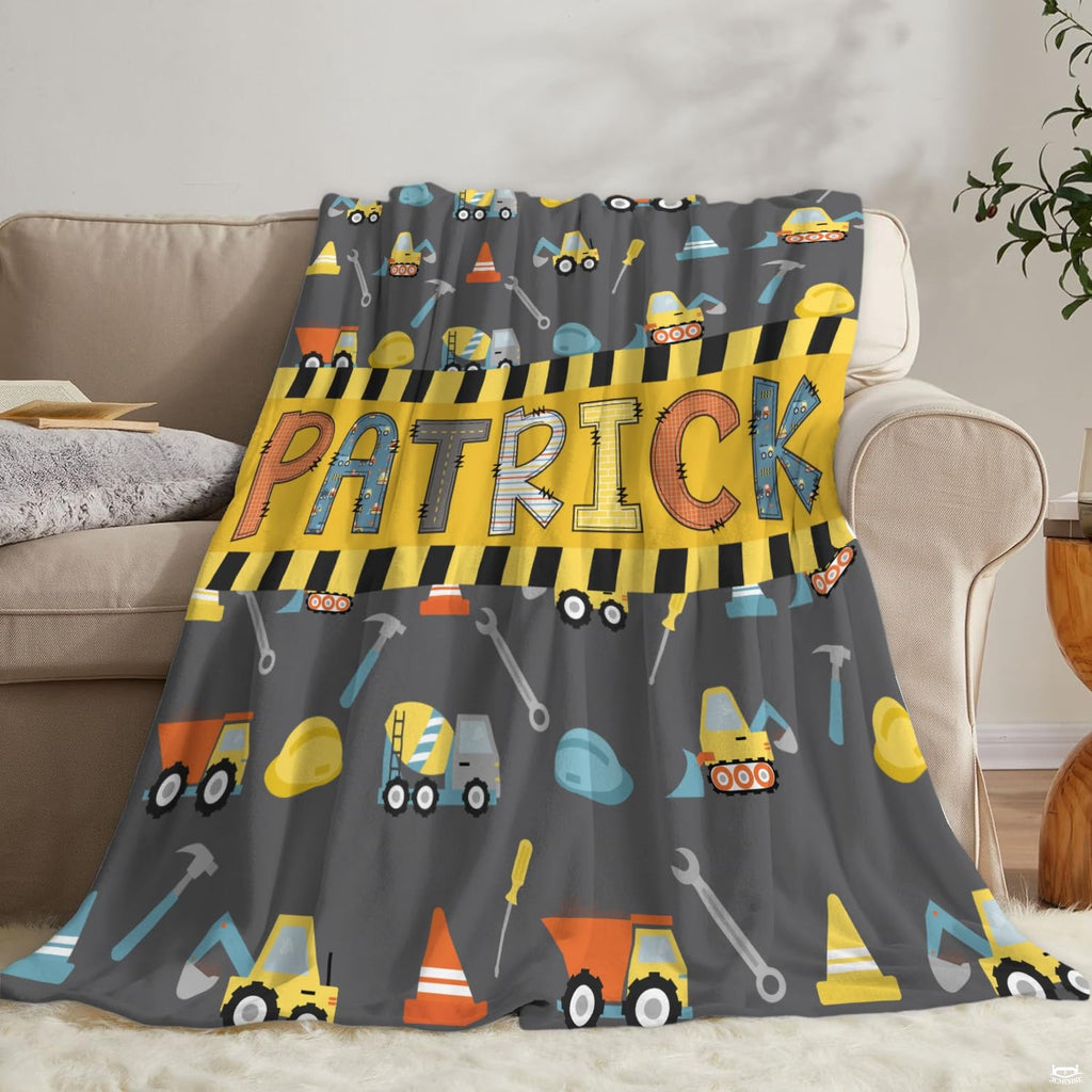 Construction dump trucks, excavators, and yellow caution stripe banner on grey background, view 7.
