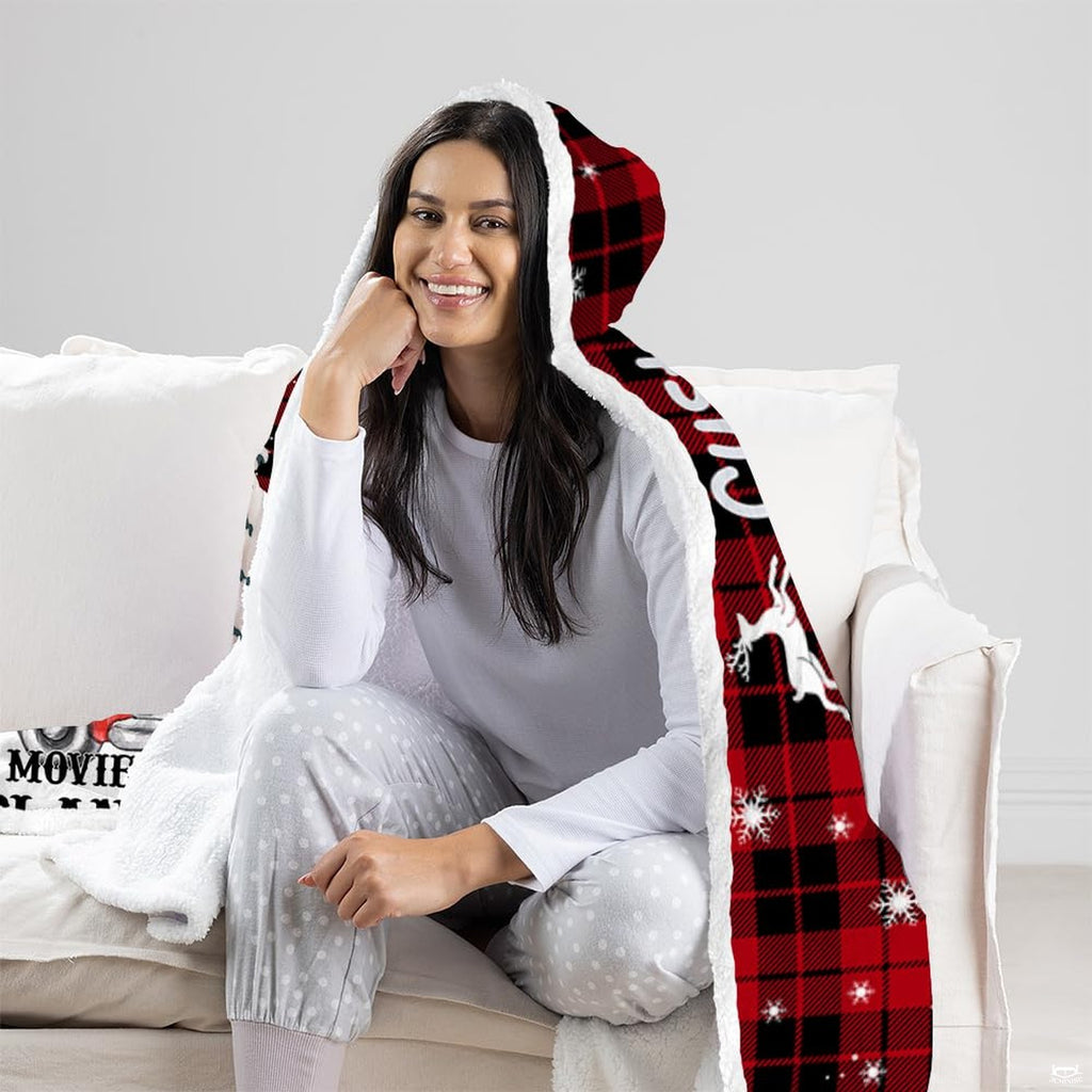 Artistic winter pattern on buffalo check holiday bedding featuring leaping reindeer and vintage truck graphics.