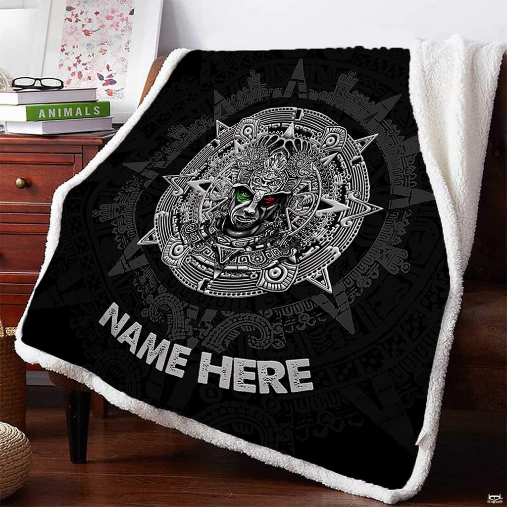Warrior sun calendar graphic textile draped over armchair beside reading books.