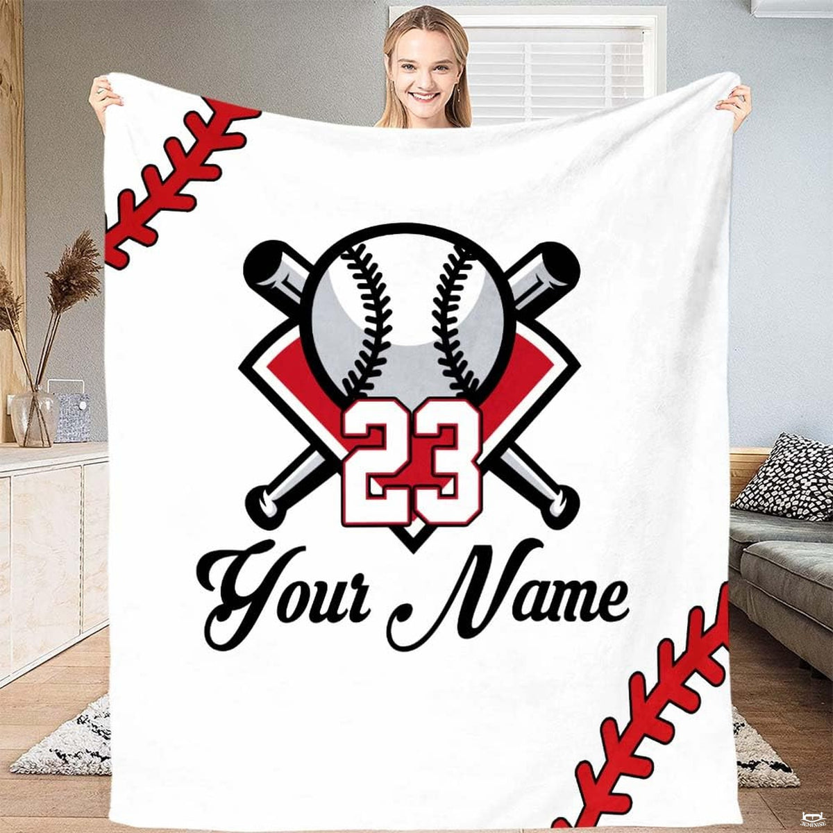 Baseball blanket featuring flame and water graphic spread evenly over a bedroom bed.