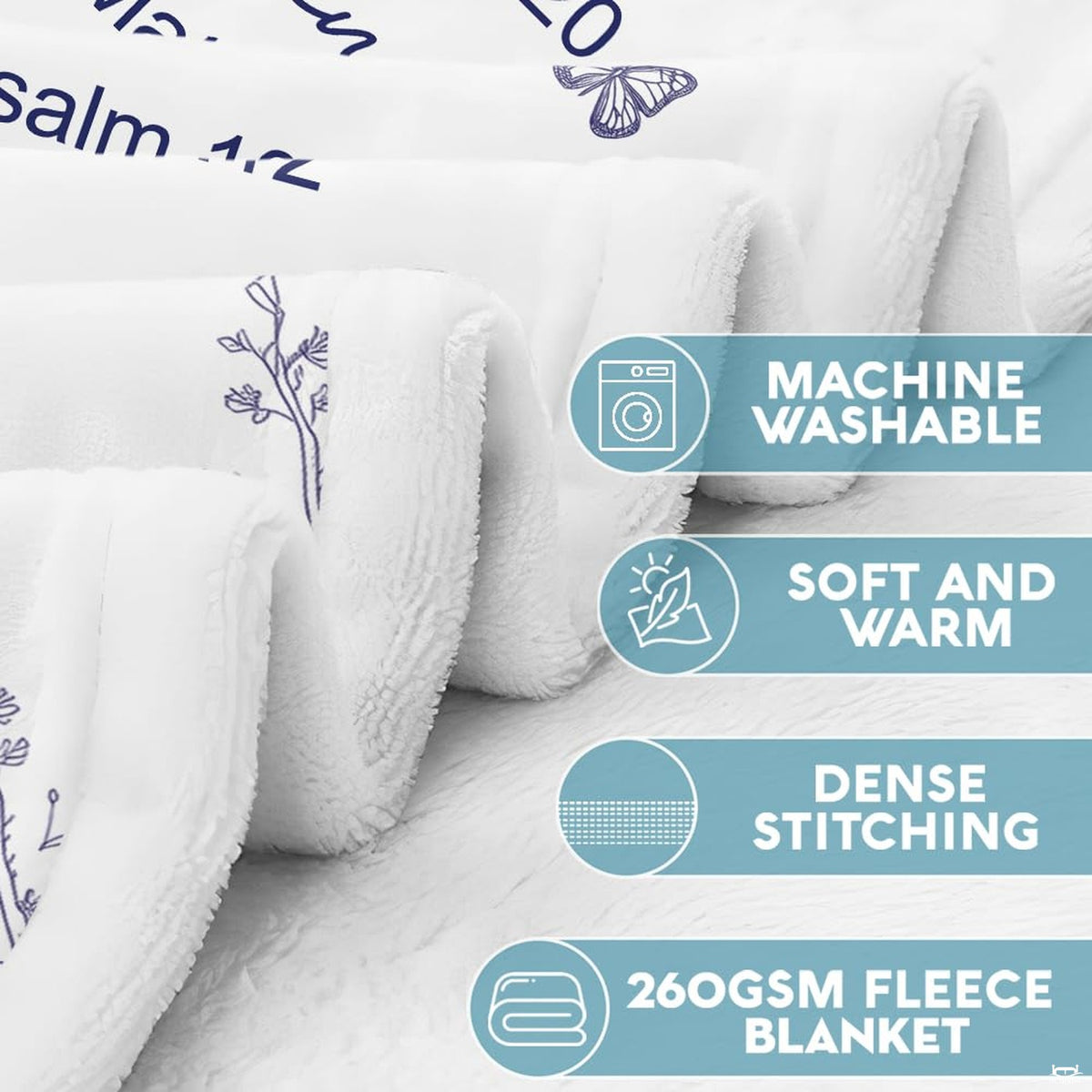 Lifestyle display of a person resting with the navy botanical faith throw blanket.