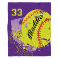 Front full perspective of purple softball throw blanket showing yellow ball and splatter artwork over home plate