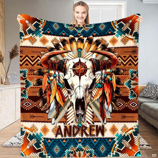 Southwestern bull skull tribal blanket featuring feathered skull on turquoise and rust geometric pattern.