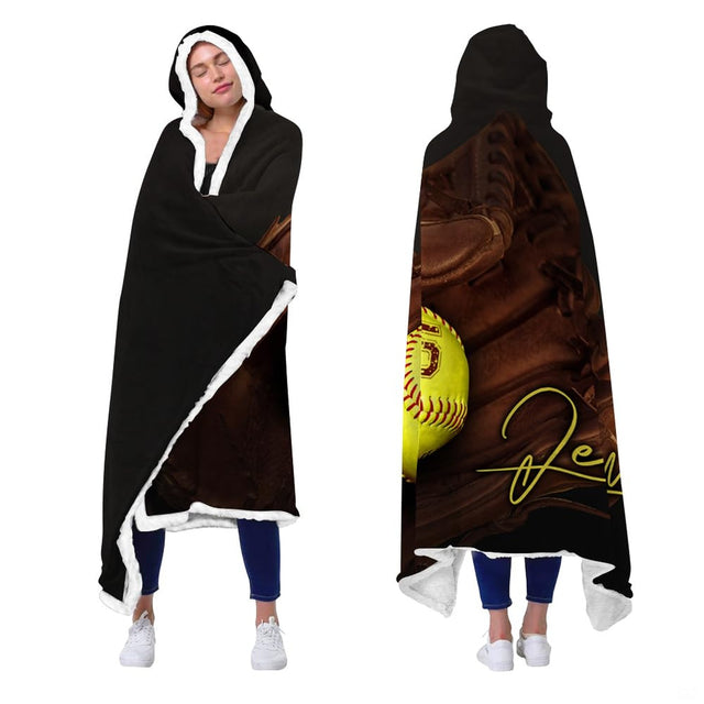 Front and rear views of a model wearing the softball glove hooded sports throw blanket.