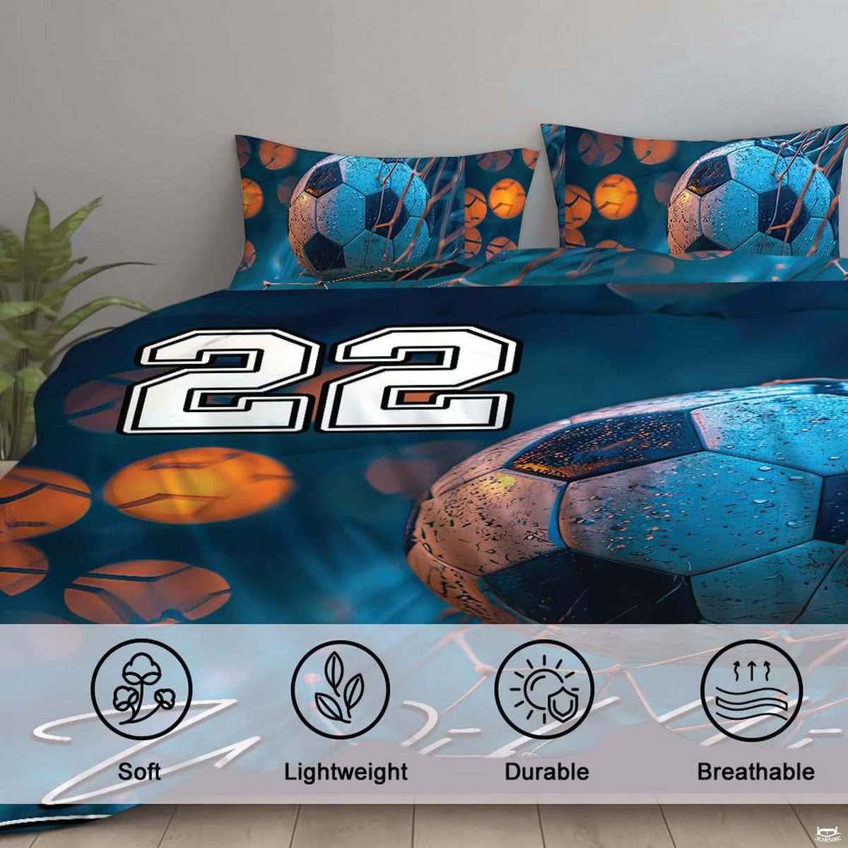 Championship soccer bedding set styled beside bedside lighting in a sleek modern sports bedroom.