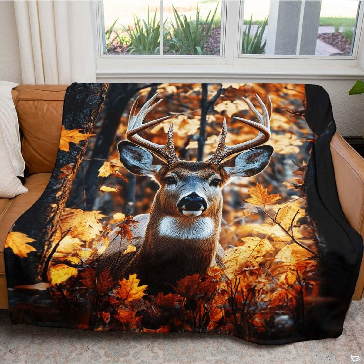 Close-up of autumn foliage and whitetail buck artwork for a serene bedroom aesthetic.
