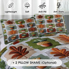 Close-up detail of pumpkin patchwork bedding displaying stylized oak leaves, acorns, and pumpkin orange accents.