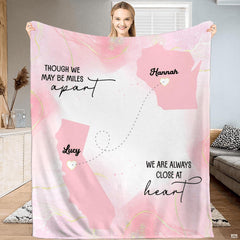 Long distance friendship map pink throw blanket displaying state silhouettes connected with heart line