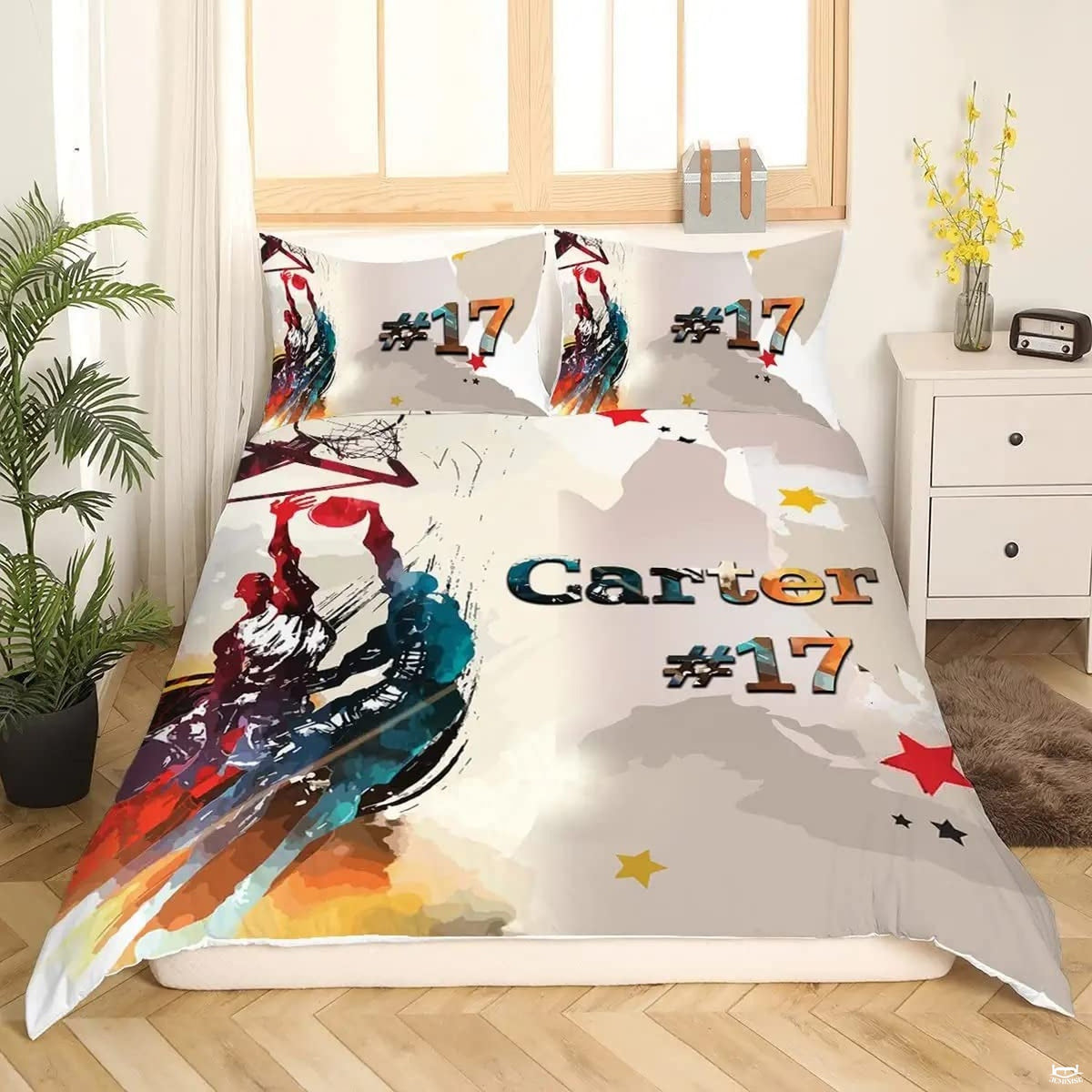 Coordinated pillow sham showcasing watercolor basketball player artwork from the sports bedding set