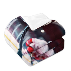 Matching pillowcase detail for hockey bedding set showing coordinating sticks, pucks, and goalie helmet art