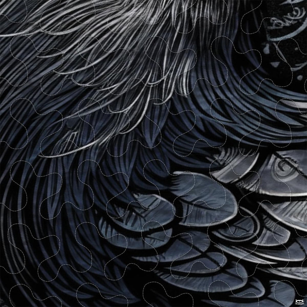Close-up view of Viking bedding highlighting detailed raven feathers, Vegvisir compass, and runic knots