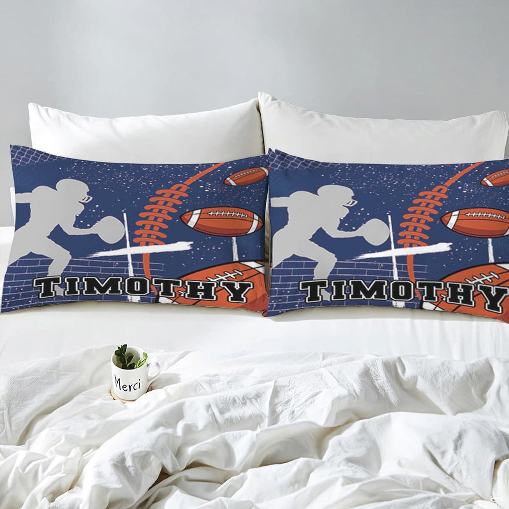 Overhead view of faith and football sports bedding laid out neatly across an interior bedroom bed arrangement