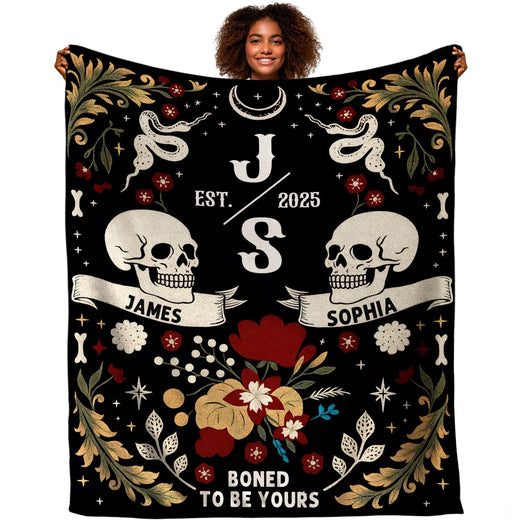 Gothic floral skulls blanket featuring paired skulls, celestial serpents, and crimson blooms.