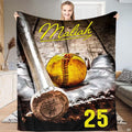 Frontal display of optic yellow ball, dark mitt, and upright metallic bat graphic on timber ground.