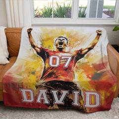 Vibrant sports theme bedding set showing athletic goal celebration artwork with fiery splatters.