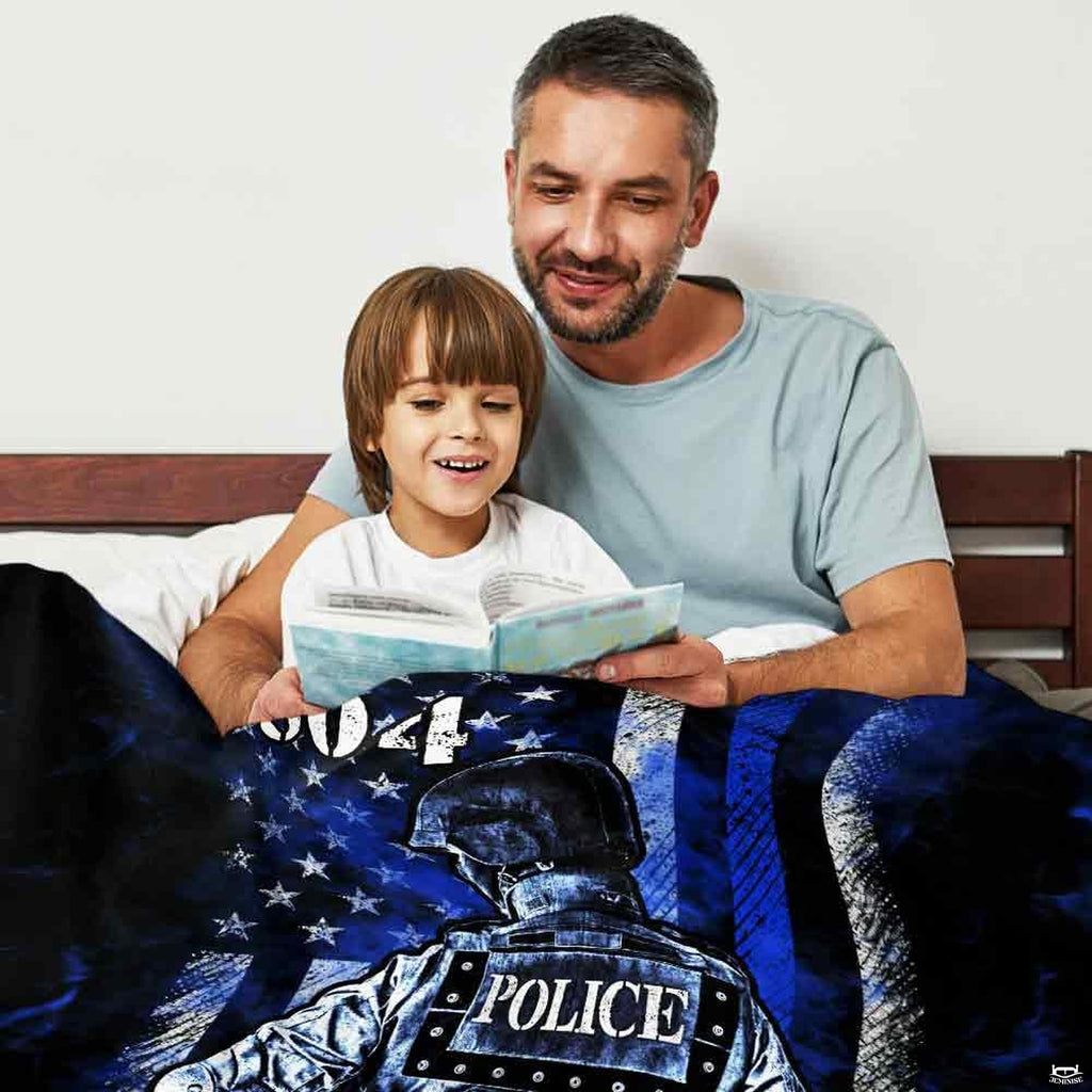 Tribute thematic accent officer back view on navy and black thin blue line backdrop artwork.