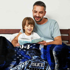 Tribute thematic accent officer back view on navy and black thin blue line backdrop artwork.