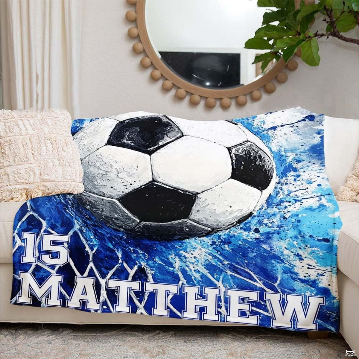 Close-up of royal blue and cerulean athletic soccer graphics.