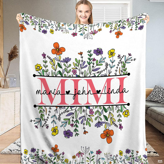 Wildflower garden floral throw blanket featuring colorful illustrated meadow flowers and botanical greenery