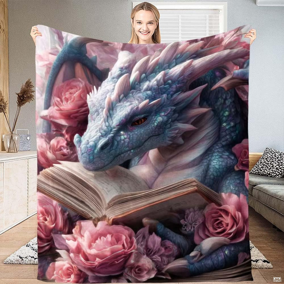 Fantasy pastel dragon with pink roses and open book illustration held open in a bright room
