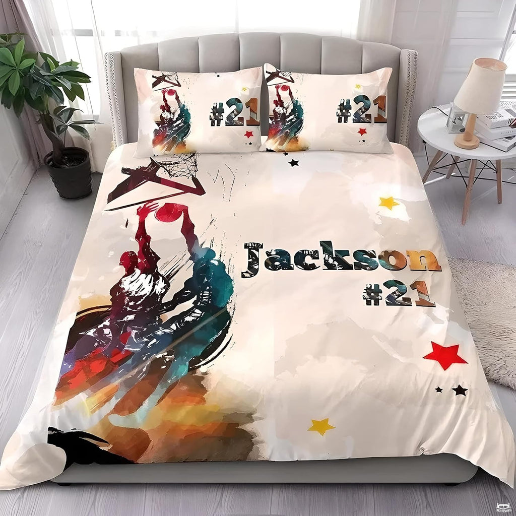 Top-down view of watercolor basketball sports bedding set neatly displayed on a bedroom mattress
