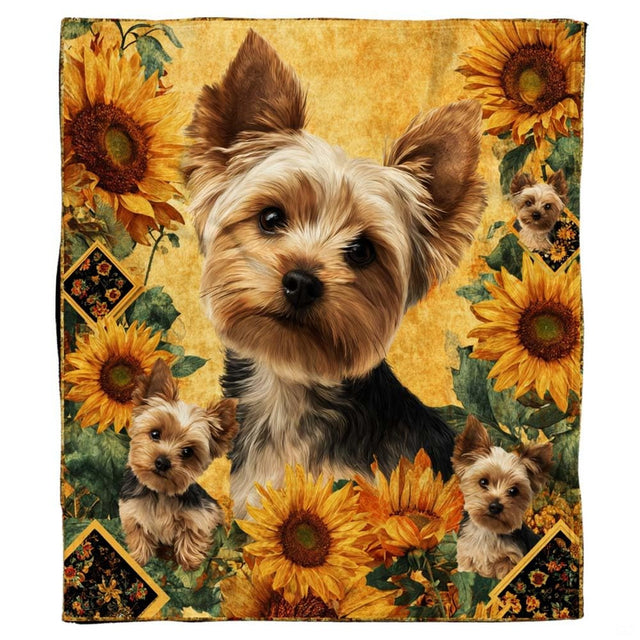 Close-up of the painted Yorkshire Terrier face displaying inquisitive dark eyes and fur textures on a blanket