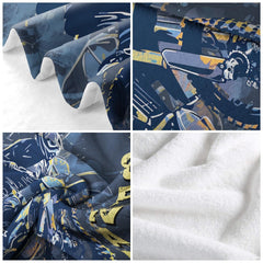 Boy bedroom decor setting featuring motocross racing throw blanket
