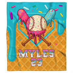 Folded dessert sports blanket highlighting dripping turquoise frosting