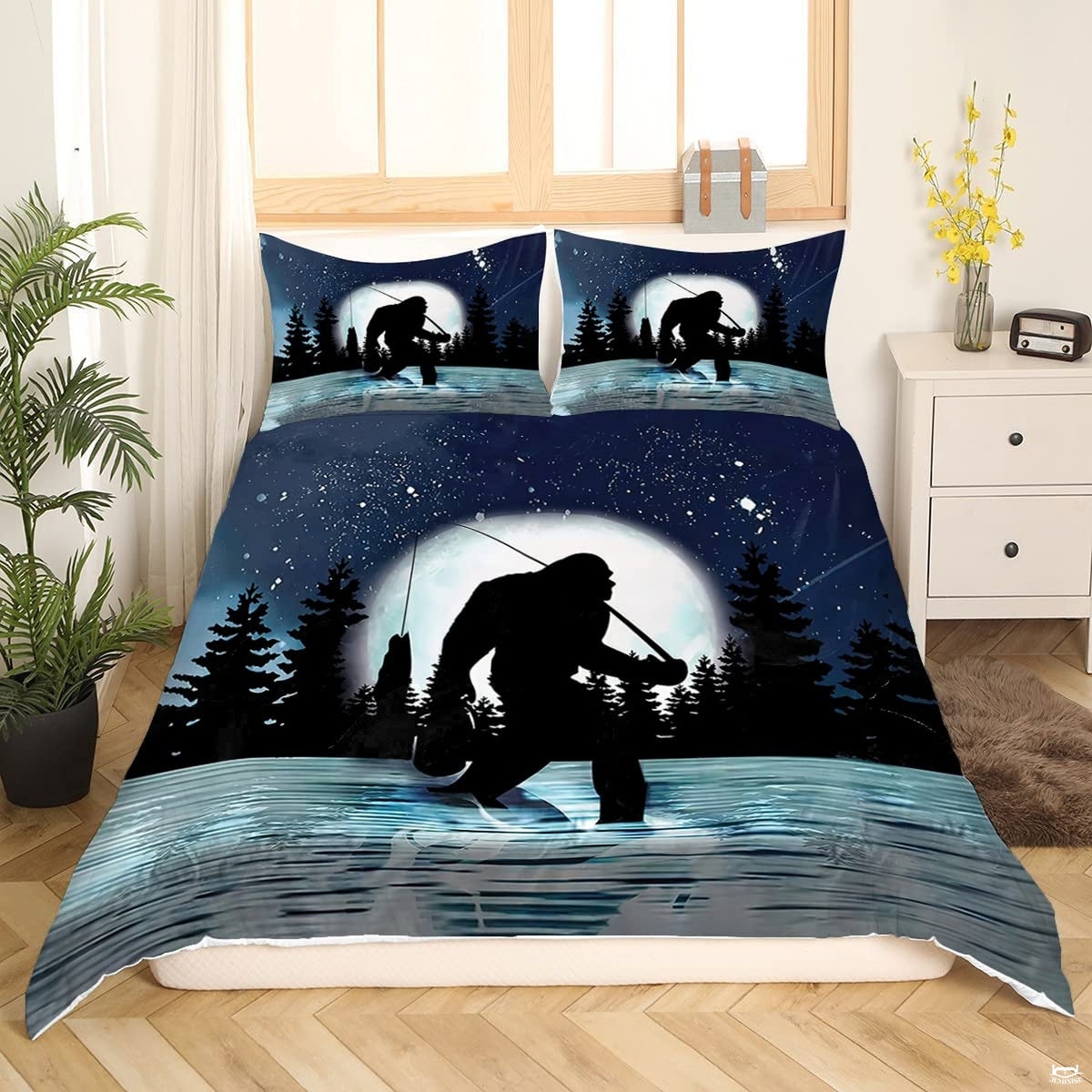 Close view of moon and pine trees on fish bedding set for kids room decor.