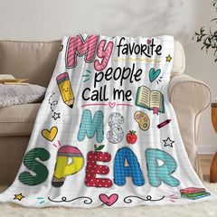 Folded throwback school theme bedding displaying cheerful thematic accent doodles and bright colors.
