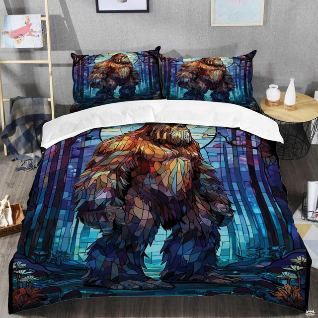 Top angle perspective of bigfoot silhouette bedding showing detailed striped sunset rings and pine tree accents.