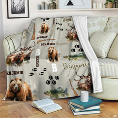 Detailed view of nature silhouettes and watercolor bear artwork styled for a cabin-inspired bedroom look.